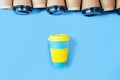 .Stylish reusable eco coffe cup and multiple single use cardboard cups