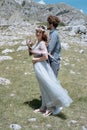 Stylish Romantic couple against the background of the mountains