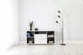 Stylish room interior with storage unit and space for design Royalty Free Stock Photo