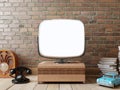 Stylish room with a TV and a retro mock up screen. Royalty Free Stock Photo