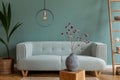 Stylish, Scandinavian living room with cmint sofa.