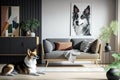 Stylish and scandinavian living room interior of modern apartment with gray sofa, design wooden commode, black table, lamp,
