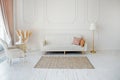 Stylish Scandinavian modern white cozy eco interior in minimalist style. Modern home decor with Pampas grass in vase. Open space. Royalty Free Stock Photo