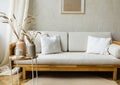 Stylish Scandinavian modern white cozy eco interior in minimalist style. Modern home decor with wheat in vase. Open