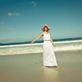 Stylish at the sea. a beautiful young woman enjoying a day at the beach. Royalty Free Stock Photo