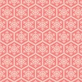 Stylish seamless pattern with geometric hexagons and delicate snowflakes in soft pink tones. Royalty Free Stock Photo