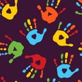 Stylish seamless pattern with prints of children`s hands