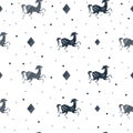 Stylish seamless pattern with running horses and dots in black and white colors Royalty Free Stock Photo