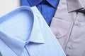 Stylish shirts on table. Dry-cleaning service Royalty Free Stock Photo