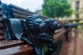 Stylish shop in the park of the city of Lviv. Sivol of the city lions on the armrests Royalty Free Stock Photo