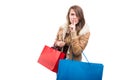 Stylish shopping girl indicate silence gesture Royalty Free Stock Photo