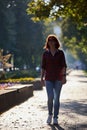 Stylish Silhouette of Redhead Woman in Urban Autumn Fashion Royalty Free Stock Photo