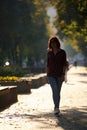 Stylish Silhouette of Redhead Woman in Urban Autumn Fashion Royalty Free Stock Photo