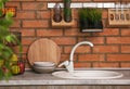 Stylish sink and faucet in modern kitchen. Royalty Free Stock Photo