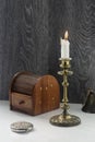 Candelabra with candle, inlaid jewelry box, women`s mirror.