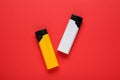 Stylish small pocket lighters on red background, flat lay Royalty Free Stock Photo