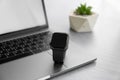 Stylish smart watch and laptop on grey table, closeup Royalty Free Stock Photo