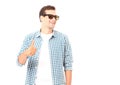 Stylish smiling guy. Cheerful young handsome man in sunglasses. Copy space. Mock up. Summer fun time Royalty Free Stock Photo