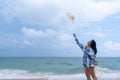 Stylish smiling woman on the beach in summer style fashion trend dress. Carefree and happy, feel free Royalty Free Stock Photo