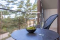 The Stylish Spacious Luxury Interior Design of Balcony in Modern Home Decor. Glass of Champagne and Grapes Fruit
