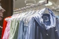 Stylish sports jackets on hangers in the store. Selective focus. Close-up Royalty Free Stock Photo
