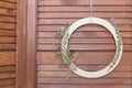 Stylish spring wreath with beautiful plants. round twig wreath with Eucalyptus leaves on rustic wooden background