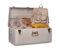 Stylish storage trunk with shoes, clothes and backpack isolated