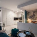 Stylish studio apartment with lights on