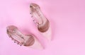 Stylish summer sandals of pastel color on pink background, close up. Top view.Flat lay with copy space Royalty Free Stock Photo