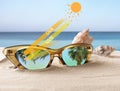 Stylish sunglasses on sandy beach near sea. UVA and UVB rays reflected by lenses, illustration Royalty Free Stock Photo