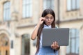 Stylish surprised pupil girl studying homework during her online lesson while social distance during quarantine, online