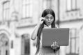 stylish surprised pupil girl studying homework during her online lesson while social distance during quarantine, online