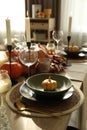 Stylish table setting with beautiful autumn decor in dining room Royalty Free Stock Photo