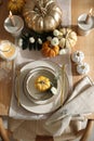 Stylish table setting with beautiful dishware and autumn decor in dining room, top view Royalty Free Stock Photo