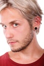 Teen boy with piercing and fashionable hairstyle Royalty Free Stock Photo