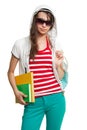 Stylish teenage girl with books