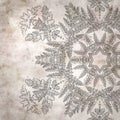 Stylish textured old paper background with kaleidoscope snowflake Royalty Free Stock Photo