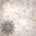 Stylish textured old paper background with kaleidoscope snowflake
