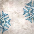 Stylish textured old paper background with kaleidoscope snowflake Royalty Free Stock Photo