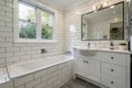 Tile bathroom interior design with bath and sink Royalty Free Stock Photo