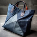 A stylish tote bag made from repurposed denim material