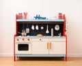 Stylish toy kitchen with oven, drawers, stove and sink equipped