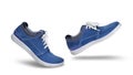 Stylish trendy blue suede shoes walking forward Royalty Free Stock Photo