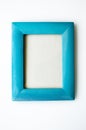 Turquoise decorative photo frame on a white background. Royalty Free Stock Photo