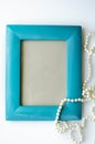 Turquoise decorative photo frame on a white background. Royalty Free Stock Photo