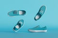 stylish turquoise sneakers with laces flying on a blue background. 3D render