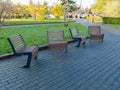 Stylish urban modern park benches Royalty Free Stock Photo
