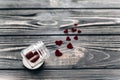 stylish velvet hearts in glass jar on black rustic wooden background. happy valentine day. unusual greeting card with space for