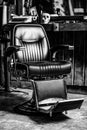 Stylish vintage barber chair. Barbershop interior. Barber shop bussines. Modern hairdresser, black and white Royalty Free Stock Photo