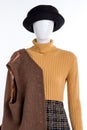 Stylish warm winter clothing on mannequin.